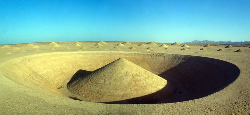 Illustration for article titled What the hell is this weird alien looking spiral in the desert?